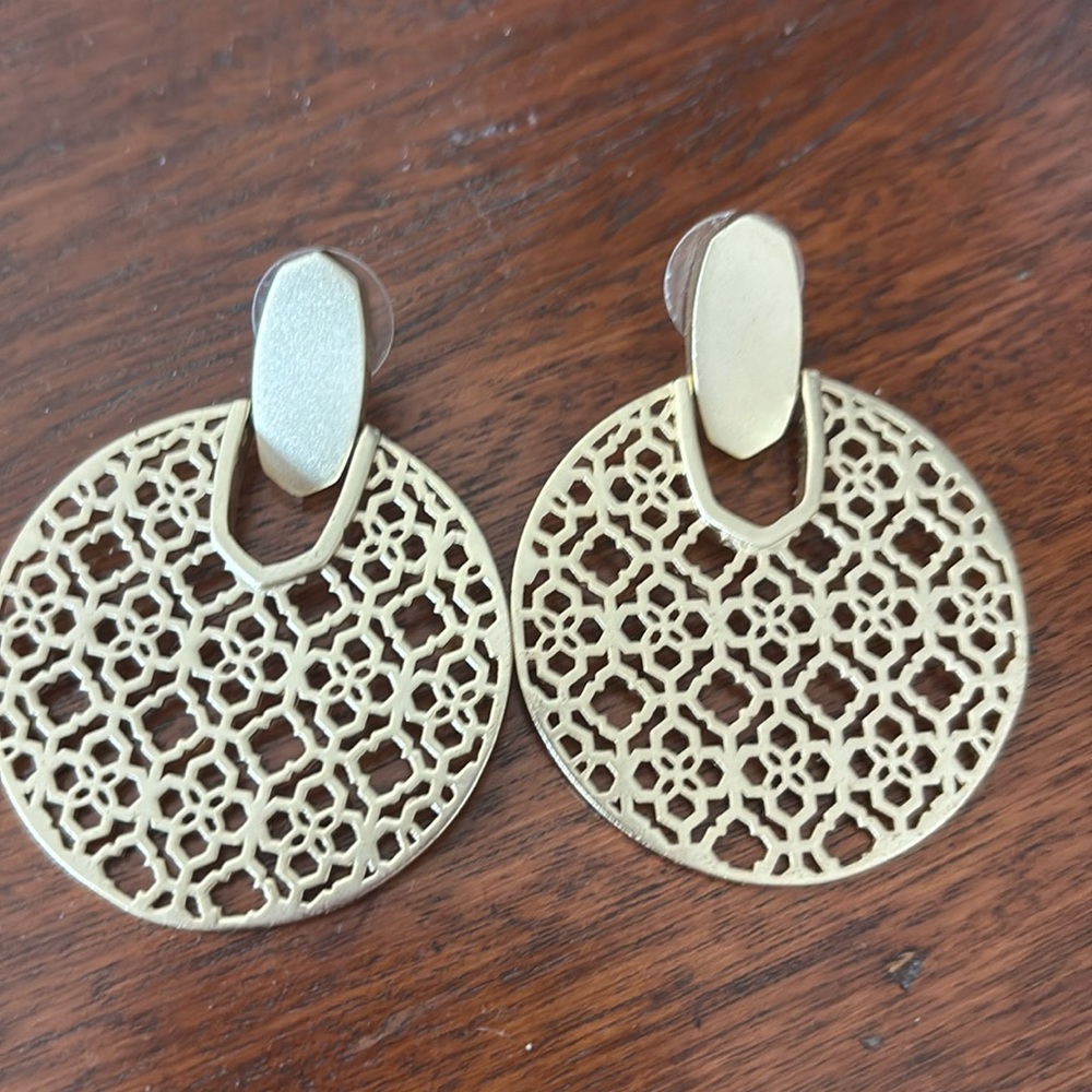 Kendra Scott earrings.